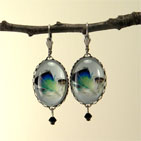 Birds of a Feather Silver Oval Earrings